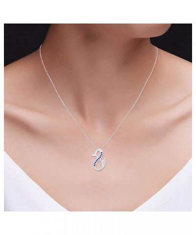 Duck Infinity Pendant Necklace in 14K White Gold Over Sterling Silver Simulated blue-sapphire $21.15 Necklaces